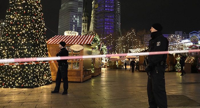 Berlin police conduct searches in refugee camp after Christmas market incident